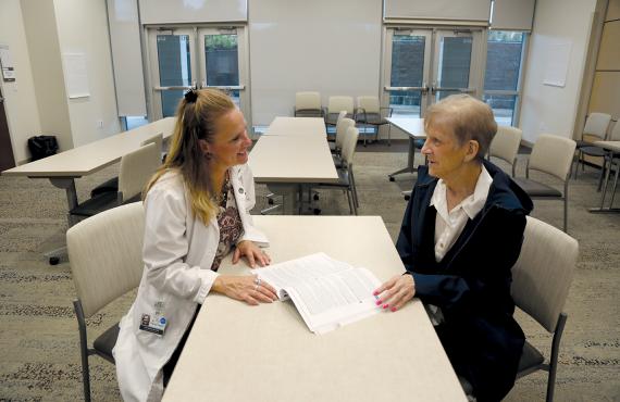 Phelps Health dietitian talks with patient