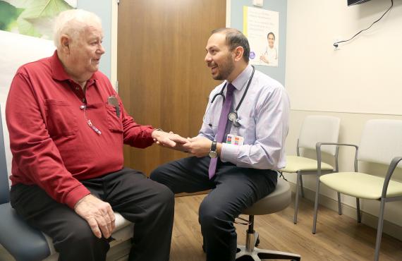  Dr. Guerrero-Garcia talks with a patient at the Phelps Health Delbert Day Cancer Institute (DDCI).