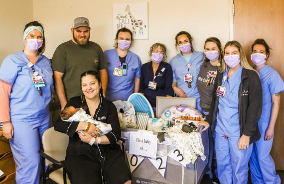 Tate Michael Huffman was the first baby born at Phelps Health in 2023. He is pictured with his parents, David and Shelby Huffman, and Phelps Health Obstetrics and Nursery staff.