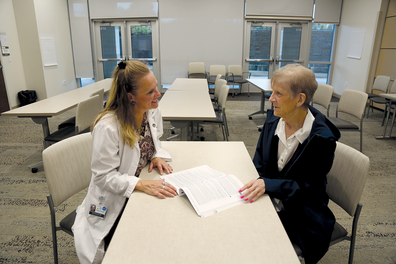 Phelps Health dietitian talks with patient