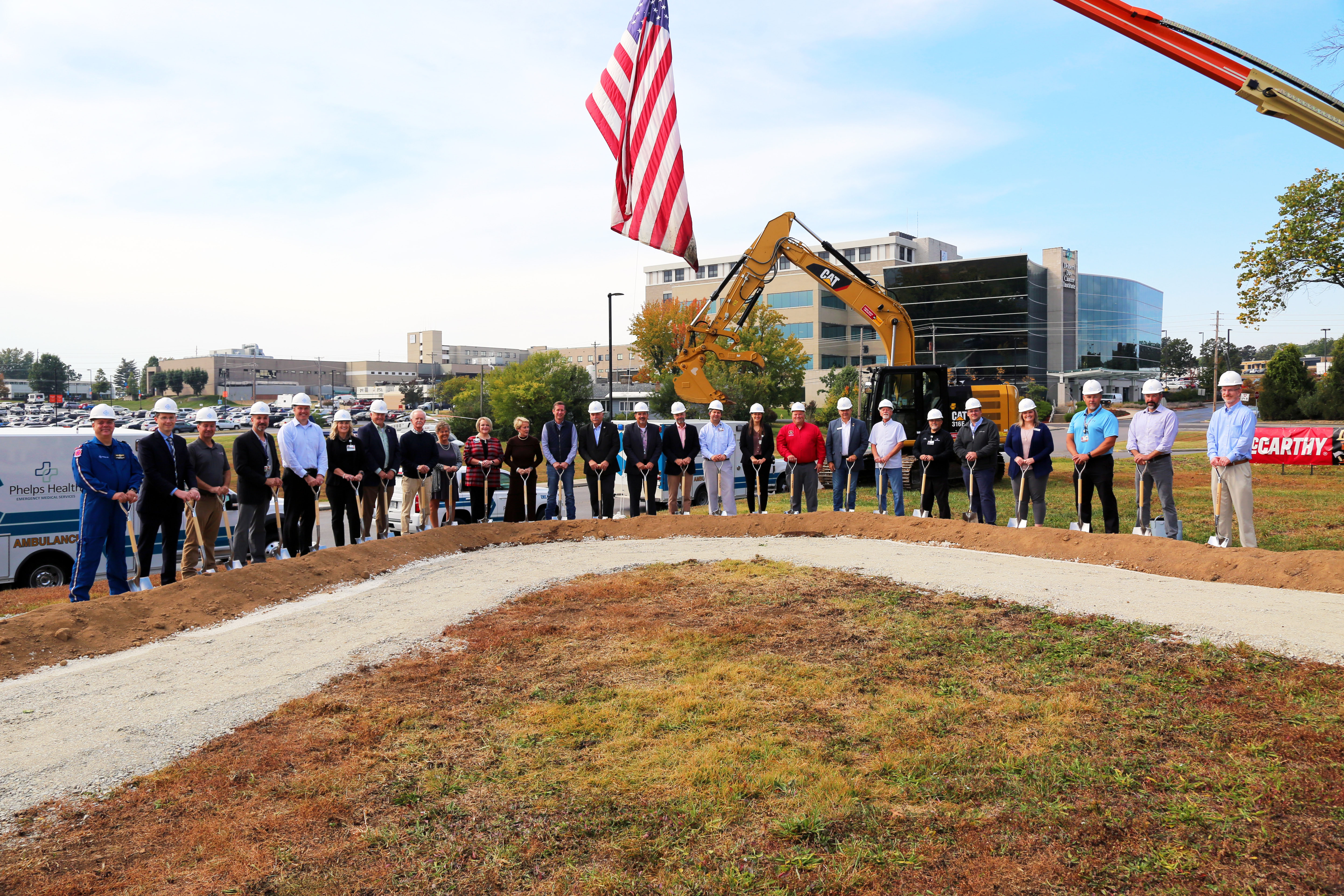 Dignitaries and stakeholders hold a groundbreaking ceremony for Phelps Health's new EMS base and second helipad.