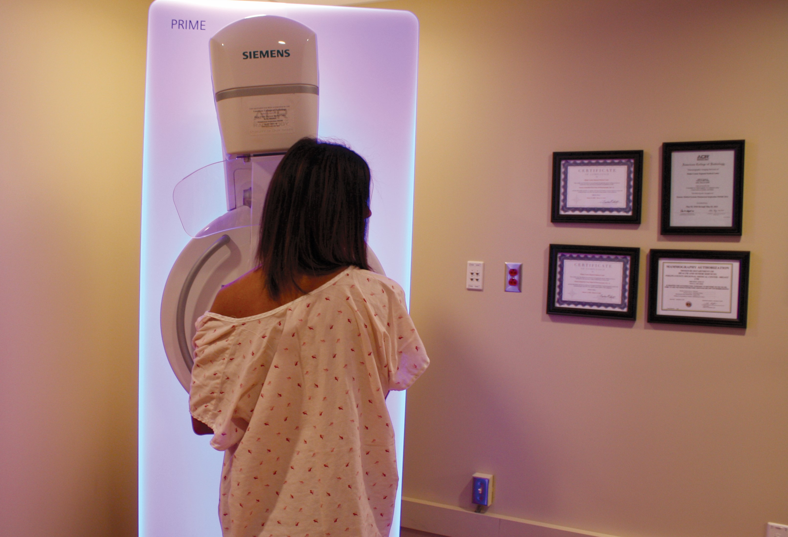 Woman getting a mammogram