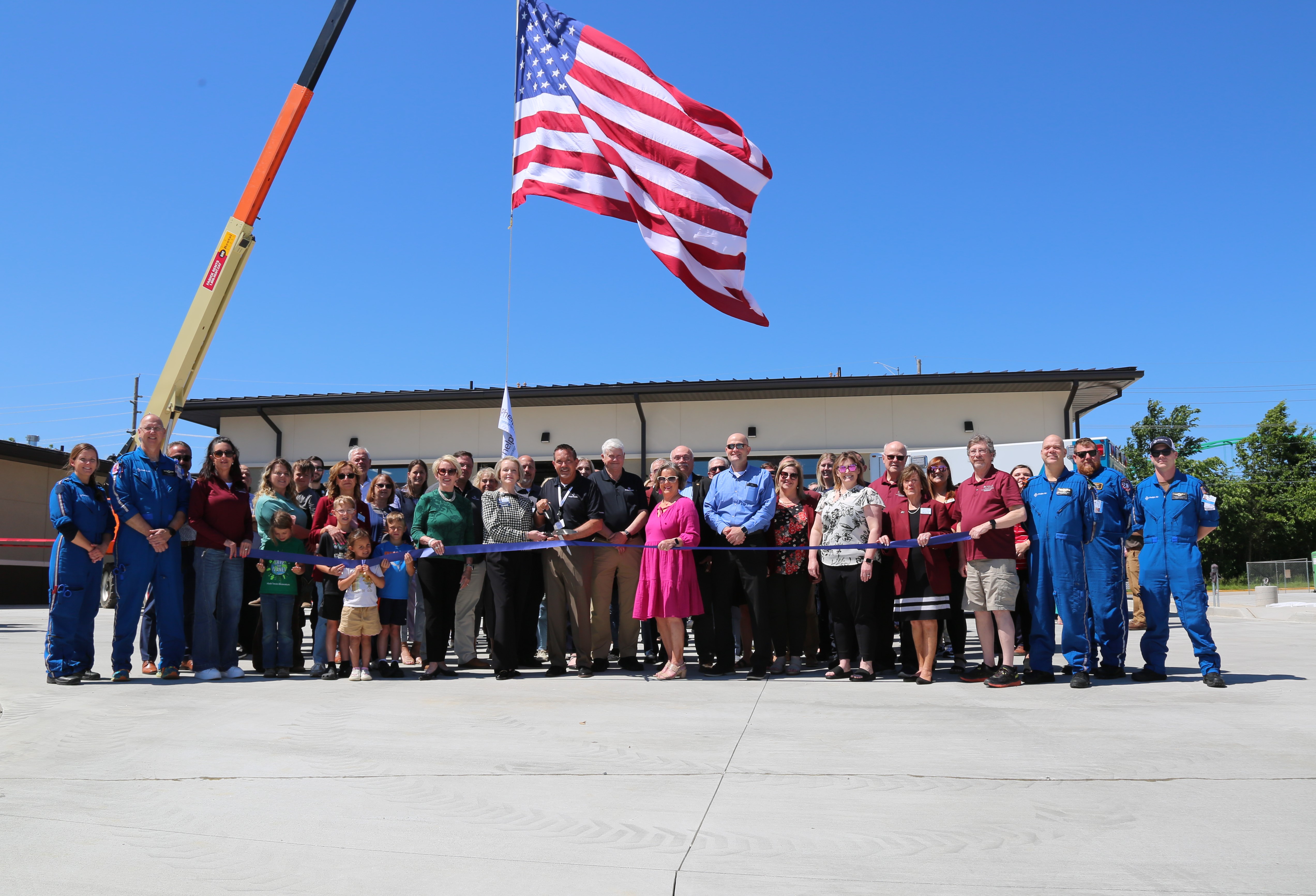 Phelps Health staff, leaders and community cut a ribbon for the new EMS base on the Rolla campus