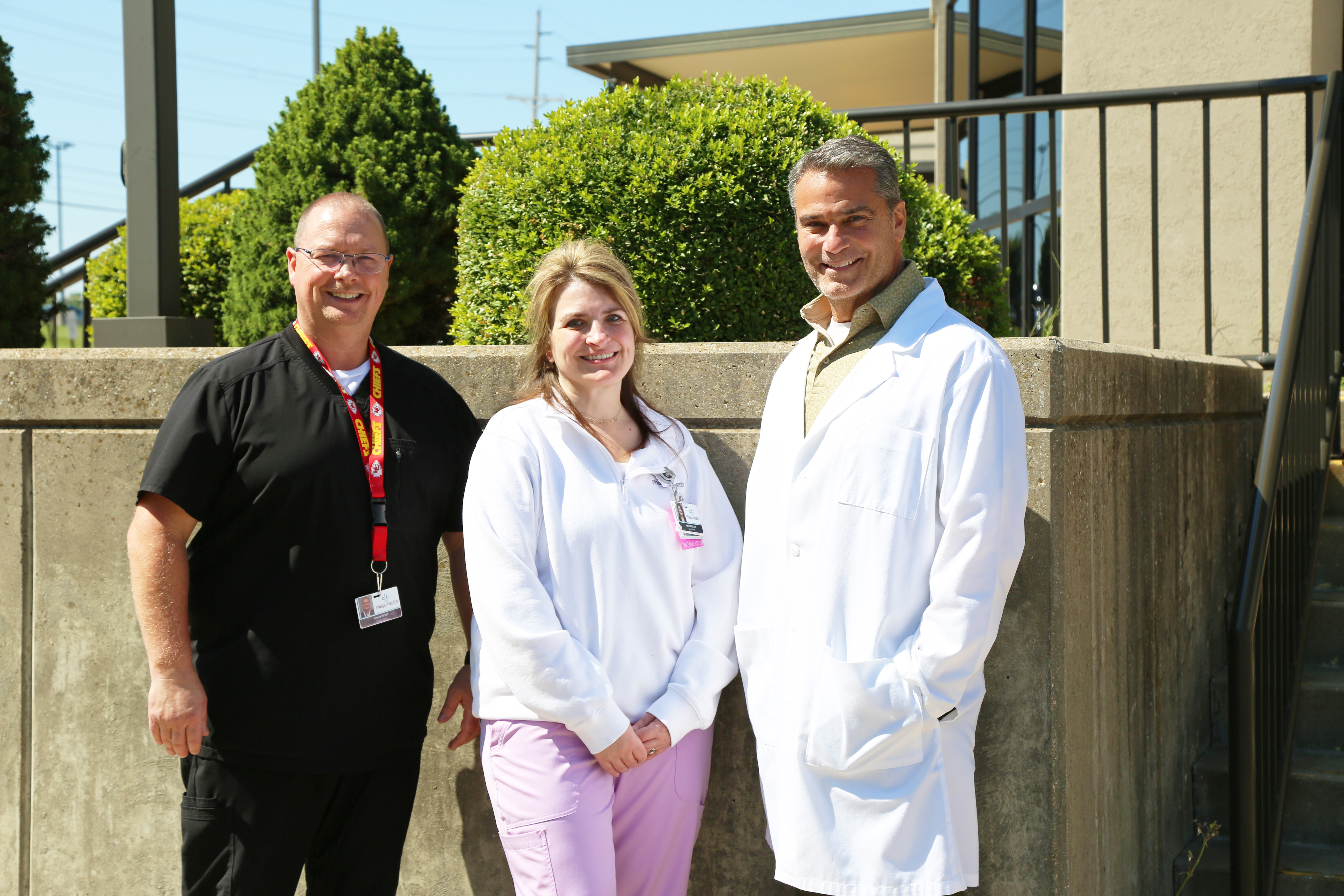 Three Phelps Health staff members celebrate sleep center milestone.