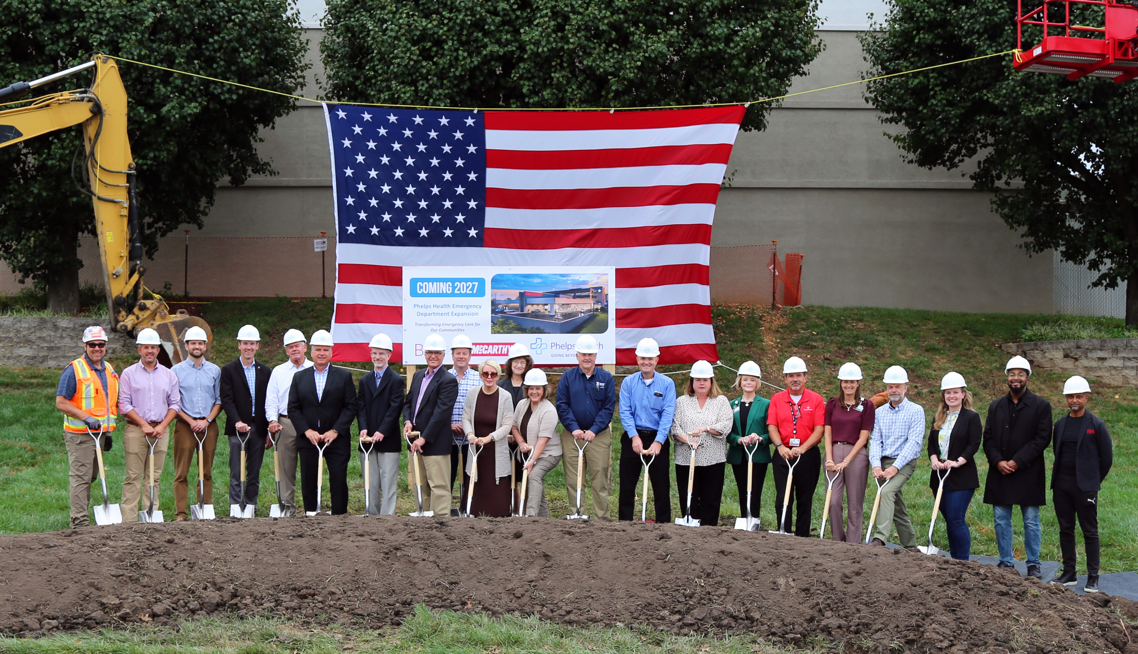Phelps Health leaders line up with shovels to break ground on new ED expansion project.