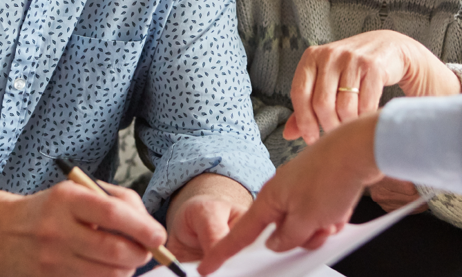People looking at paperwork