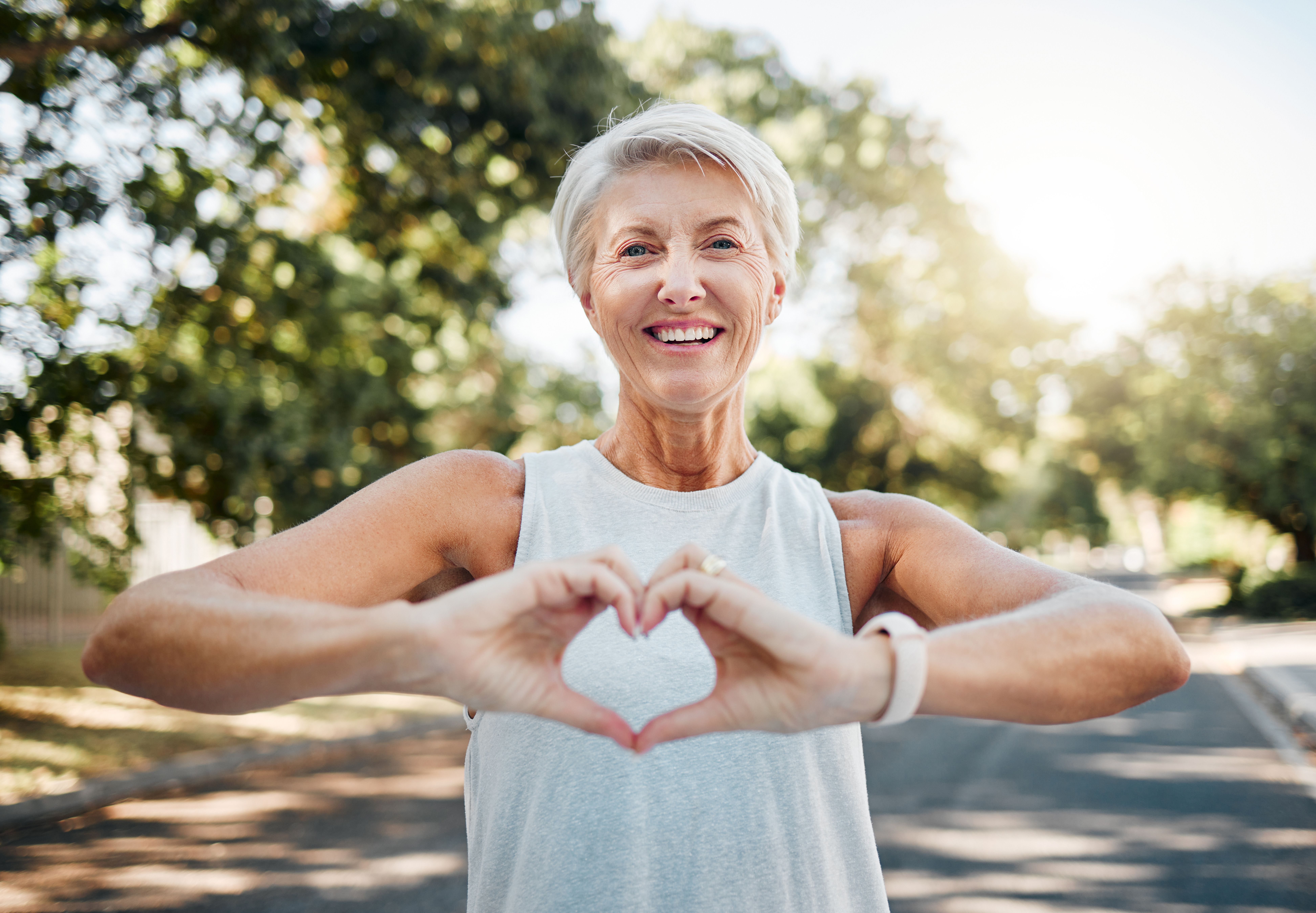 Woman making heart with hands