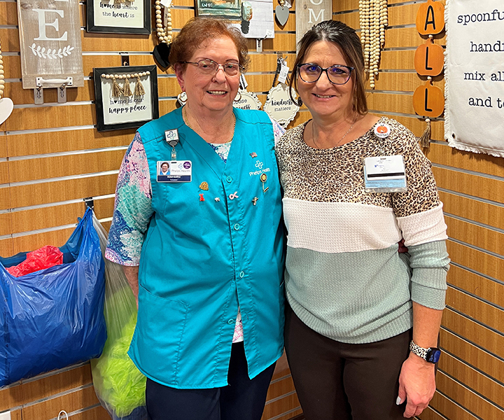 Auxiliary Volunteer Mabel Godfrey with Gift Shop Merchandiser Deanna Brown