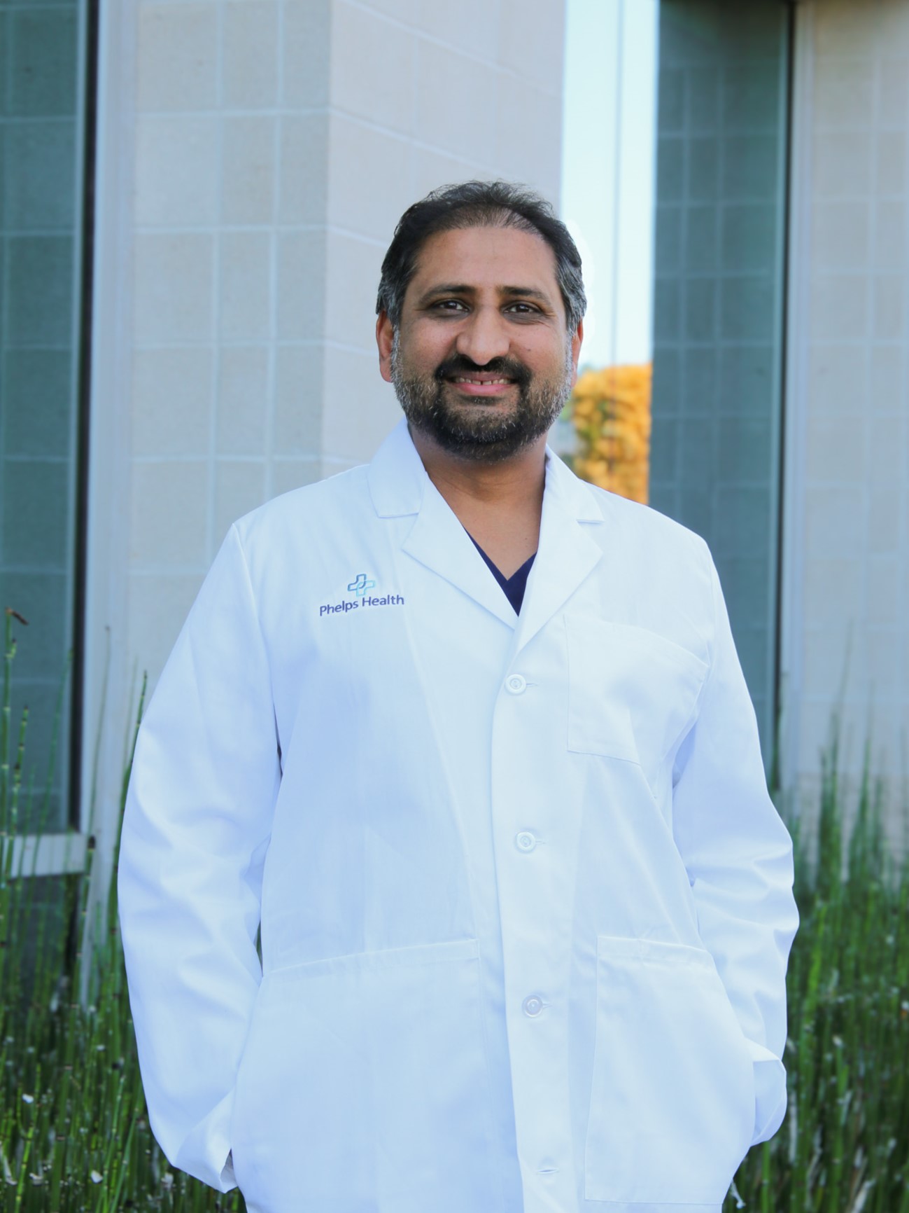 Dr. Qamar Zaman headshot