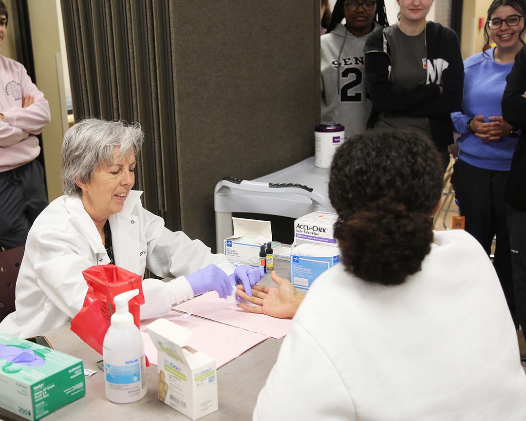 Students learn about phlebotomy. 