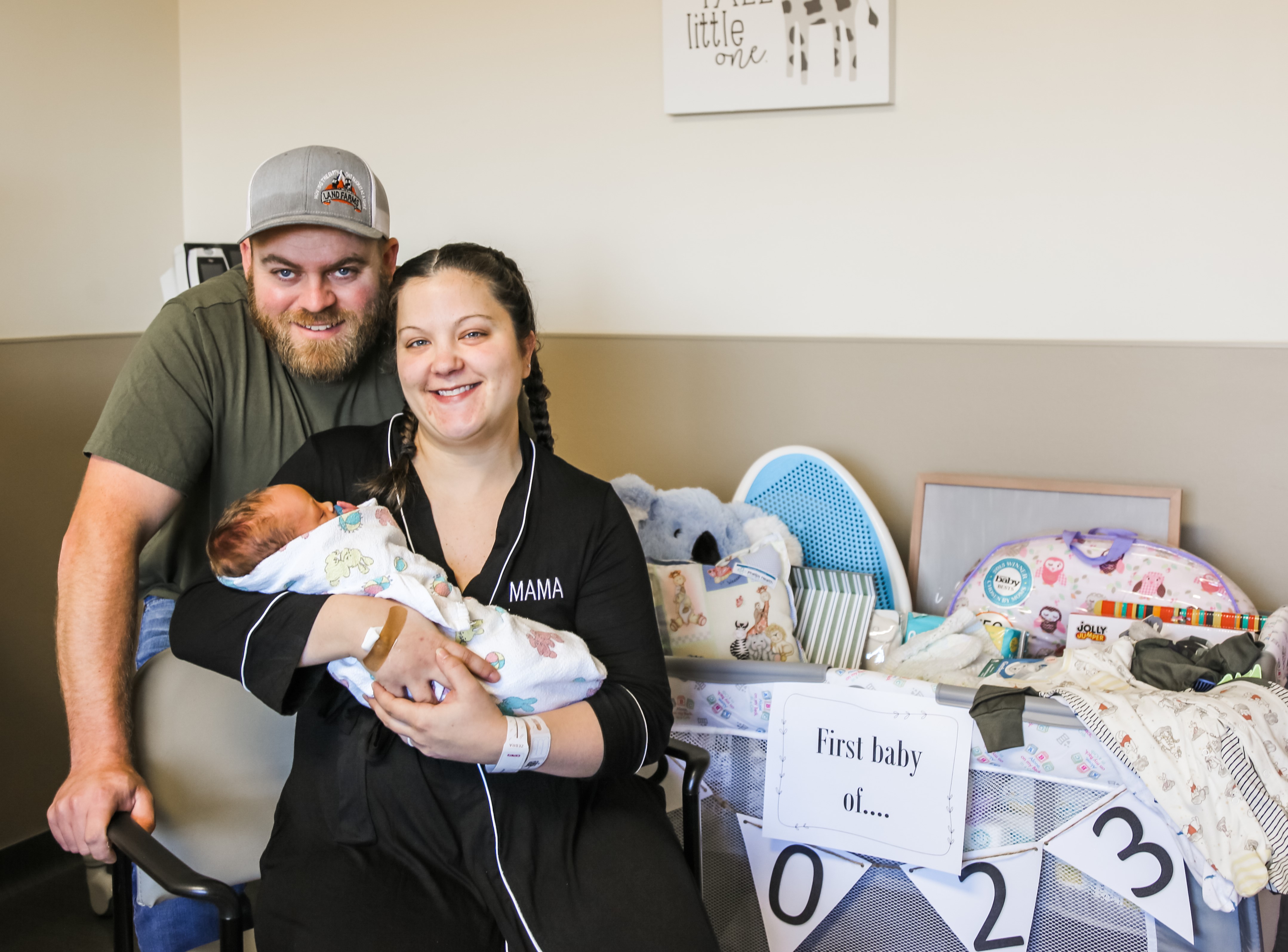 New parents David and Shelby Huffman were given a play pen full of baby gifts.