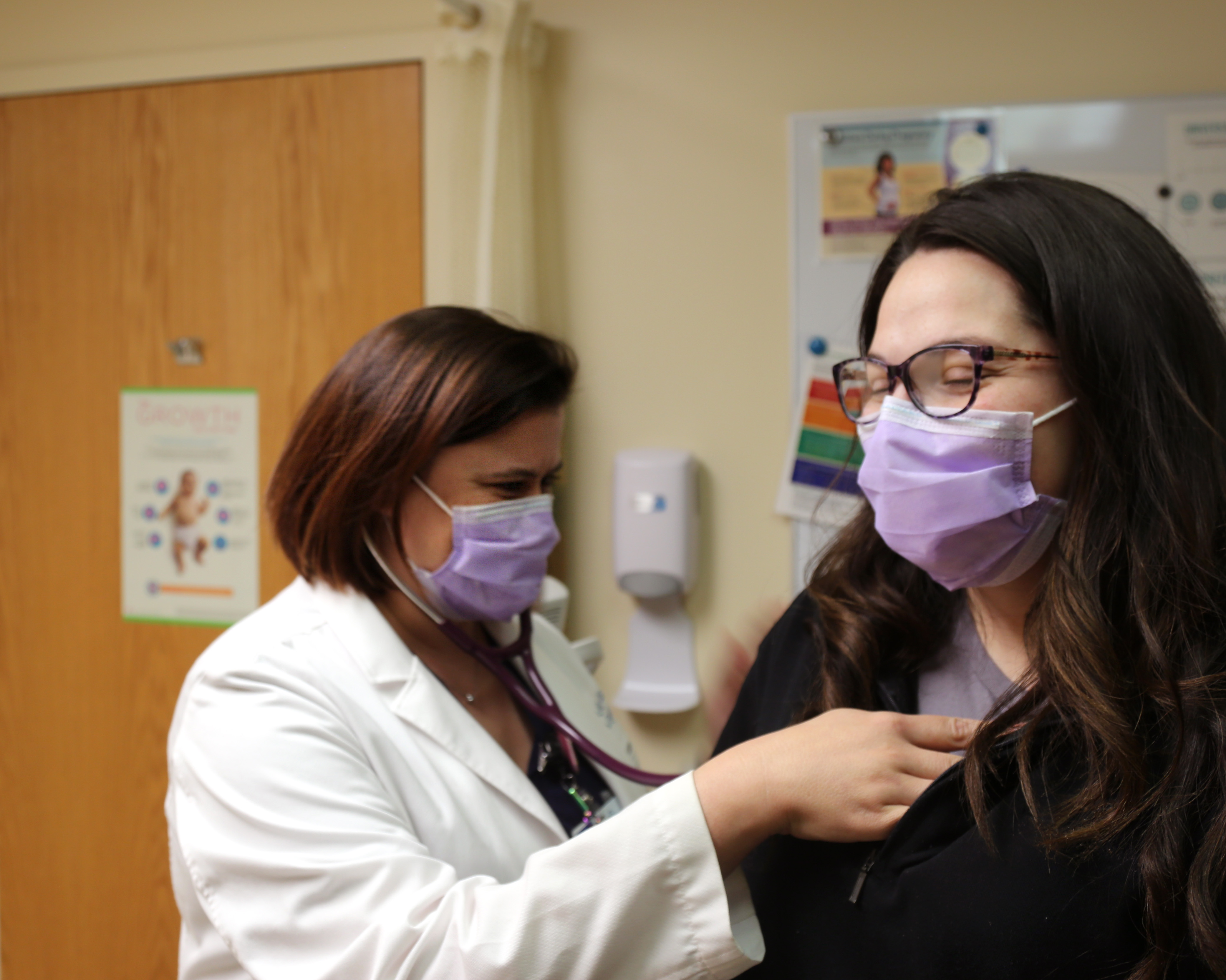 Dr. Jenny Pennycook, OB/GYN, with a patient
