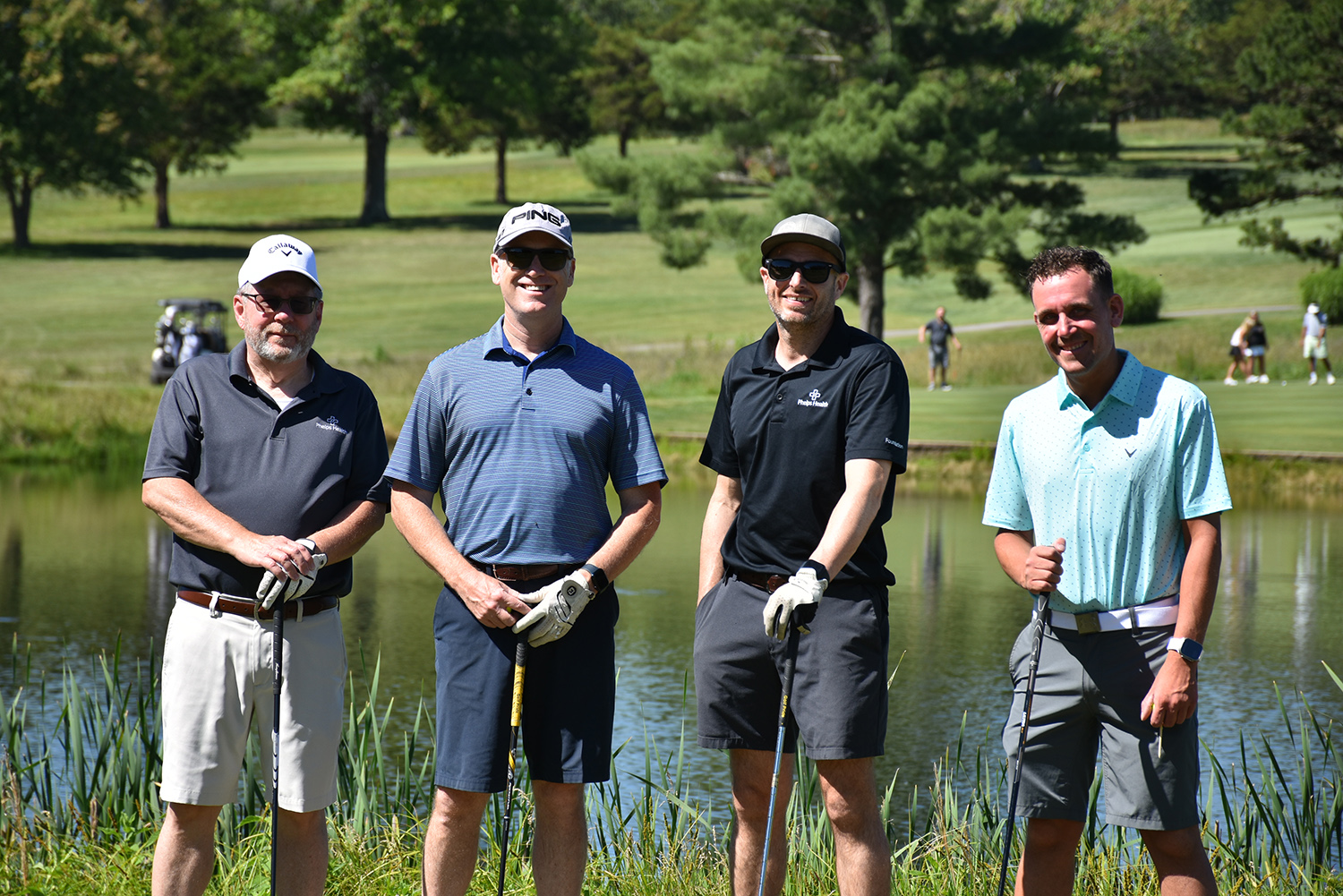 Four golfers