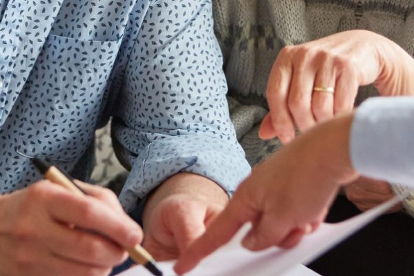People looking at paperwork