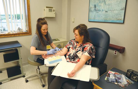 Phelps Health nurse giving patient an allergy test Phelps Health nurse giving patient an allergy test