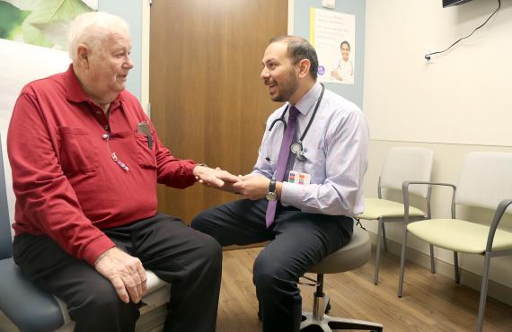 Dr. Guerrero-Garcia talks with a patient at the Phelps Health Delbert Day Cancer Institute (DDCI). Dr. Guerrero-Garcia talks with a patient at the Phelps Health Delbert Day Cancer Institute (DDCI).