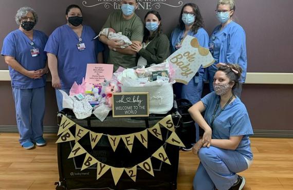 Phelps Health Labor and Delivery Unit staff with parents of first baby born at Phelps Health in Rolla in 2021