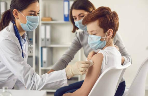 Kid getting vaccine Kid getting vaccine