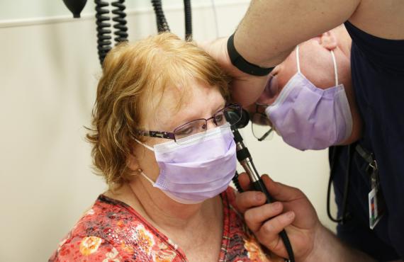 A patient sees a provider at Walk-In Clinic