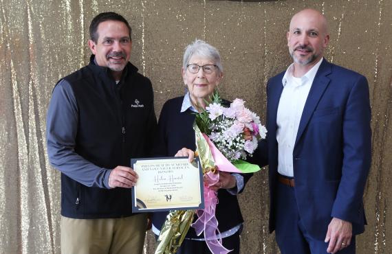 Volunteer Helen Hoertel with Jason Shenefield and John Money