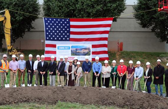Phelps Health leaders line up with shovels to break ground on new ED expansion project.